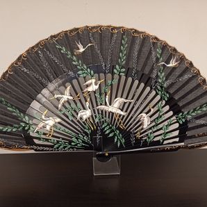 abanico pintado cigüeñas